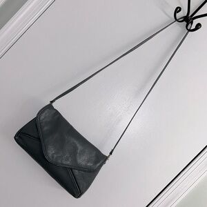 Genuine leather strap purse with snap closure